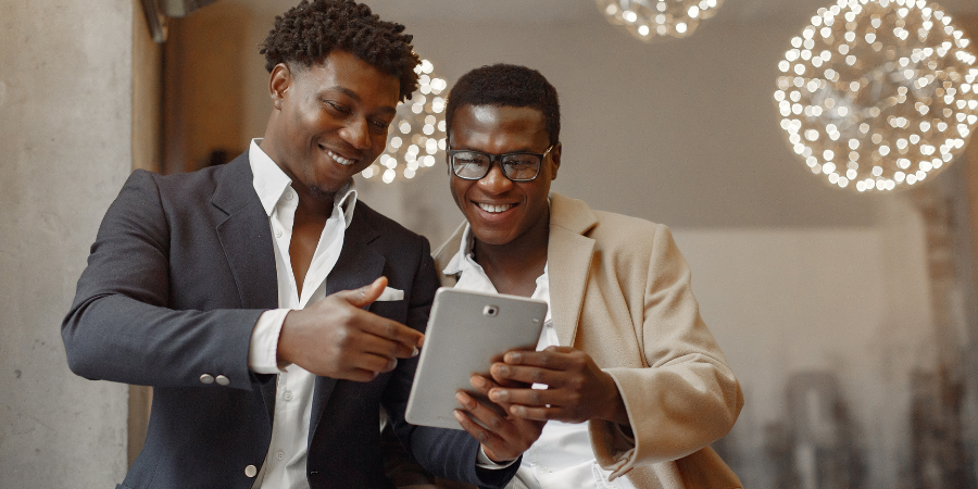 Businessmen Looking at Digital Tablet