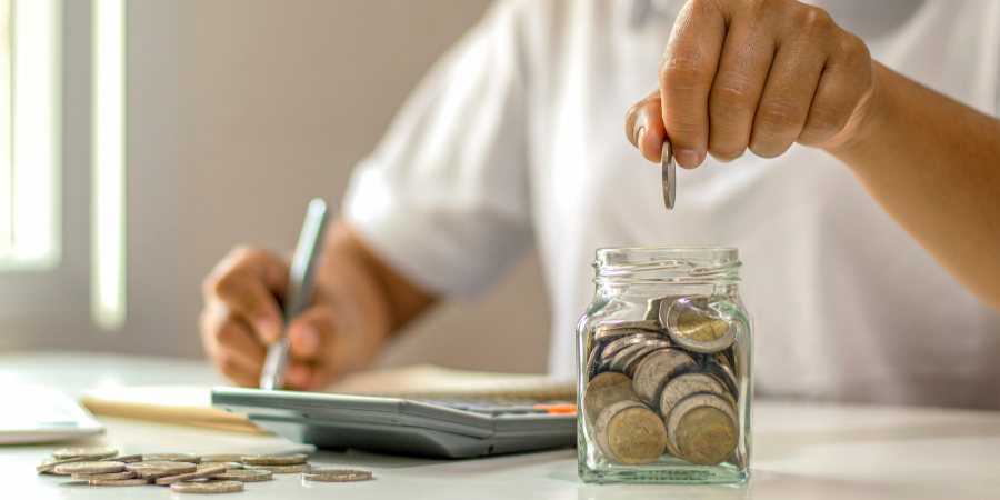 man calculating pennies
