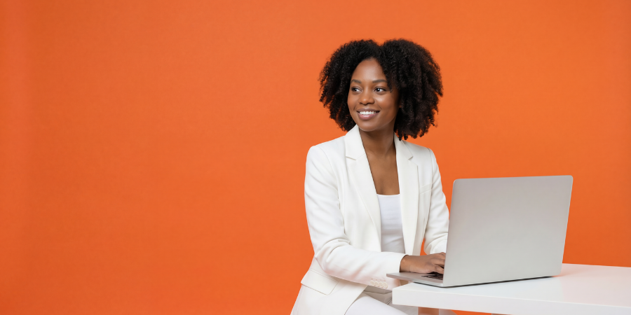 smiling lady using laptop